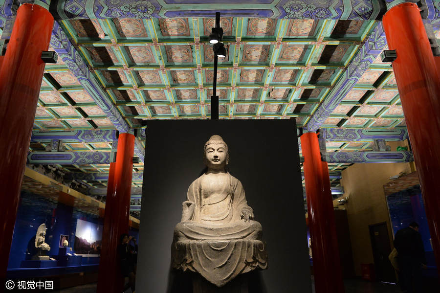 Chinese and Indian sculptures on display at the Palace Museum in Beijing