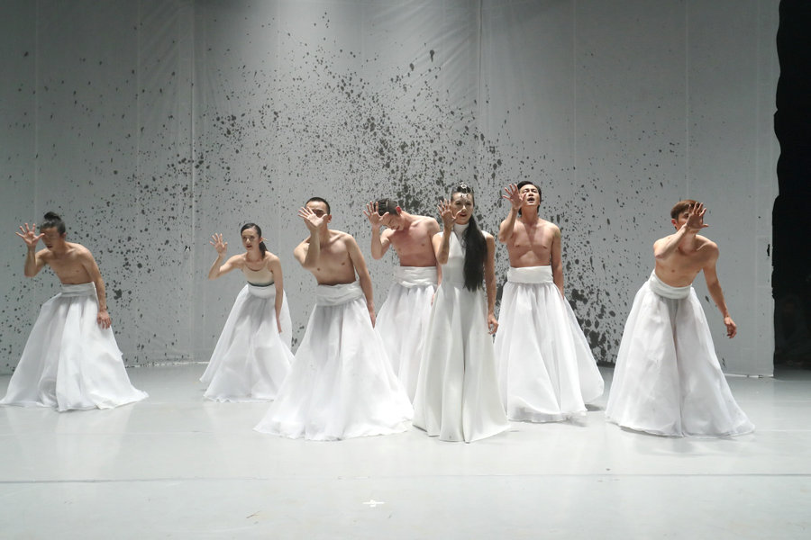 Modern dance performance represents human relationships