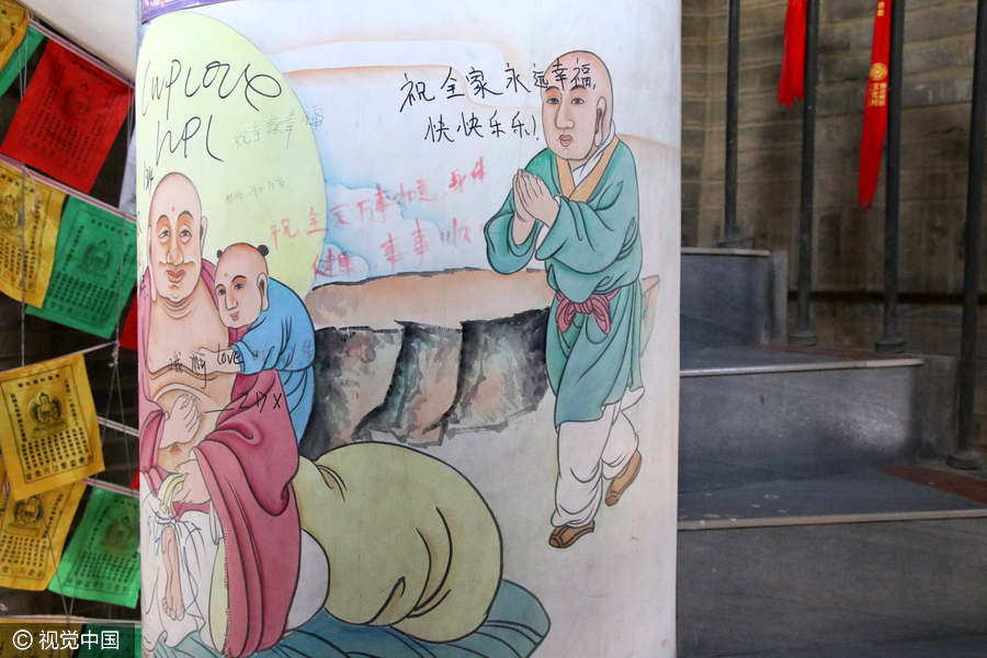 Thousand-year-old pagoda defaced by tourist graffiti