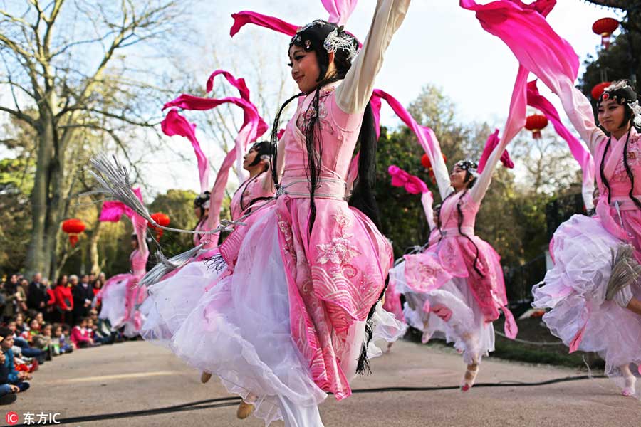 Traditional Chinese costume shines around the globe