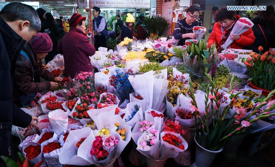 Customers shop at flower market in Beijing