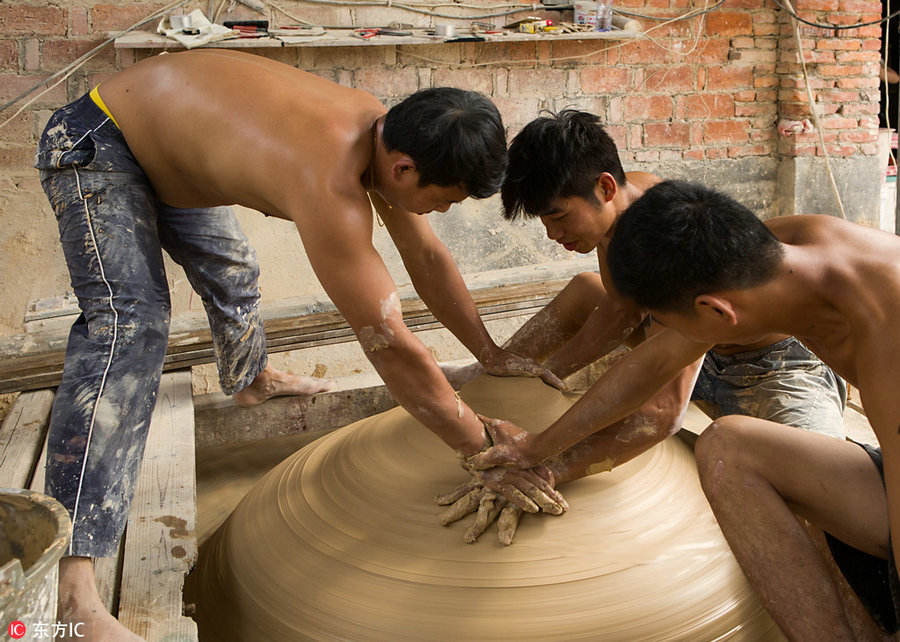 Sweat and clay: Process of making Jingdezhen's porcelain