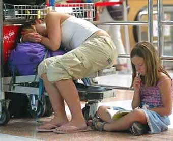 Swedish tourists wait for their flight at Phuket Airport, Thailand December 29,2004. Scandinavian countries are preparing themselves for national tragedies as realization dawns that most of the Europeans missing after the south Asian tsunami are from Sweden and Norway. 