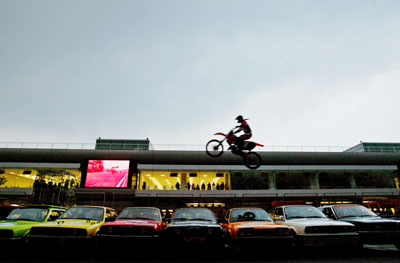  Hollywood stunt actor performs a stunt at the Shanghai International Circuit March 12, 2006. The Hollywood stunt team started their tour of China and performed during the intermission of the 2006 China Circuit Championship on Sunday. 