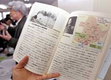 Japan approves textbook glossing wartime atrocities