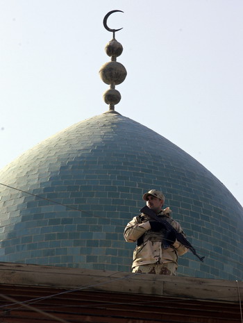 Iraqi soldiers on guard as sectarian violence broke out