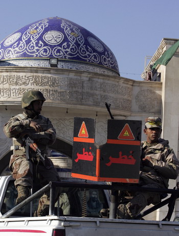 Iraqi soldiers on guard as sectarian violence broke out