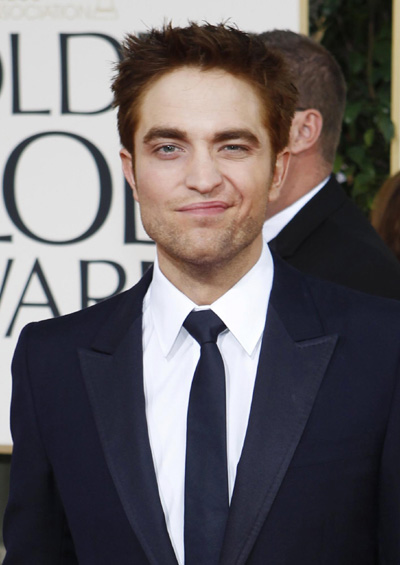 Robert Pattinson arrives at the 68th annual Golden Globe Awards