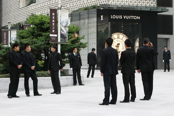 Gong Li attends opening ceremony for Louis Vuitton