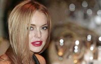 Lindsay Lohan says she's an addict, aims 'to shut up and listen'