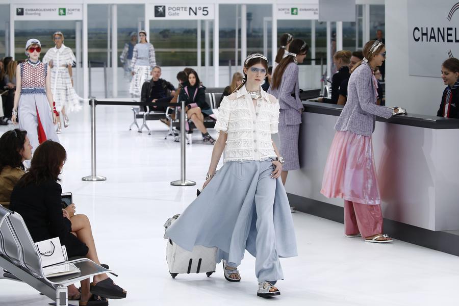 All aboard Chanel Airways as Lagerfeld's imagination takes flight