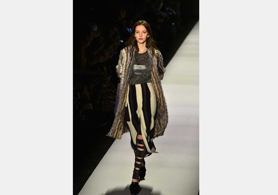 Models present creations of BCBGMAXAZRIA at New York Fashion Week