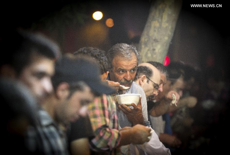 Muslims break their fast during month of Ramadan