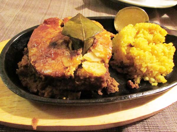 Dining alongside sand, sea and some feral cattle