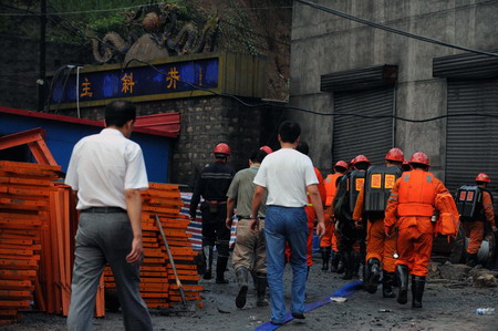 Coal mine flood traps 9, eight confirmed alive