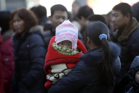 China begins annual Spring Festival travel rush