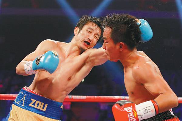 Zou's KO victory boosts shot at world title in Nov