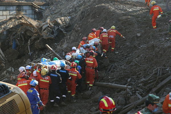 Mudslide deaths rise to 23; 14 missing