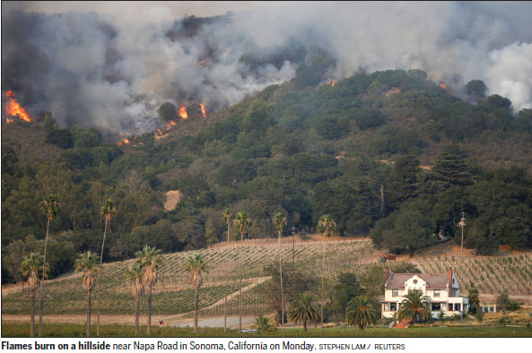 10 die as Calif. fires sweep wine country