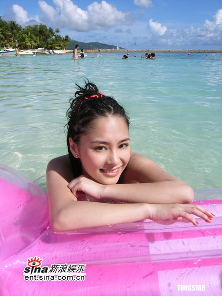 Gillian Chung poses in bikini when shooting the music videos and cover photo for their latest Cantonese album "Ho Hoo Tan" on Saipan Island, United States. 