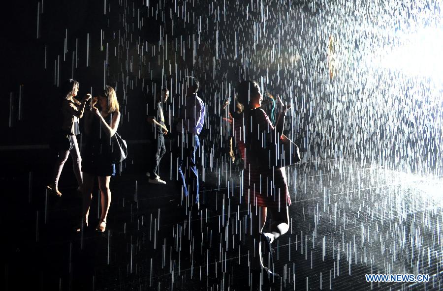 People experience 'Rain Room' art installation in New York