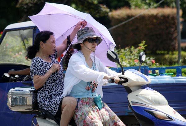 Making umbrellas manly is simple: Cast a chivalrous shadow