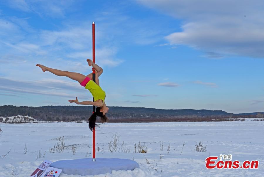 Pole dancers perform in China's North Pole