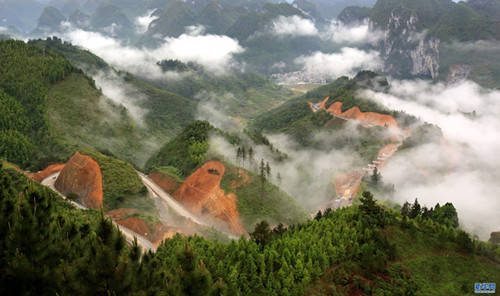 Mountains submerged in fog