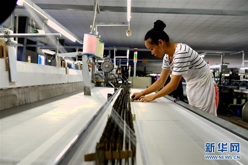 Yizhou's silk industry grows in leaps and bounds