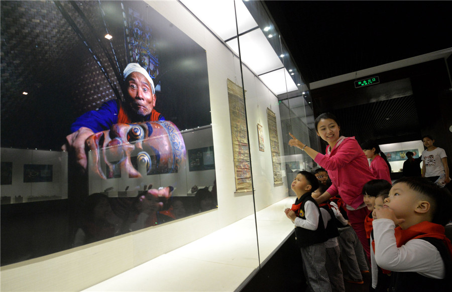 Exhibition showcases ancient art of Nuo opera