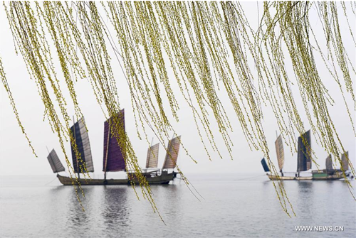 Boats sail on Taihu Lake in Wuxi