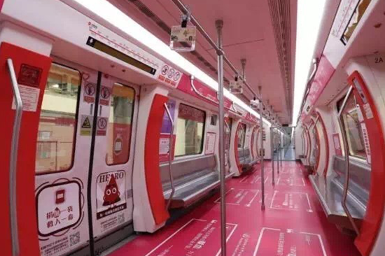 Red metro train promotes giving blood