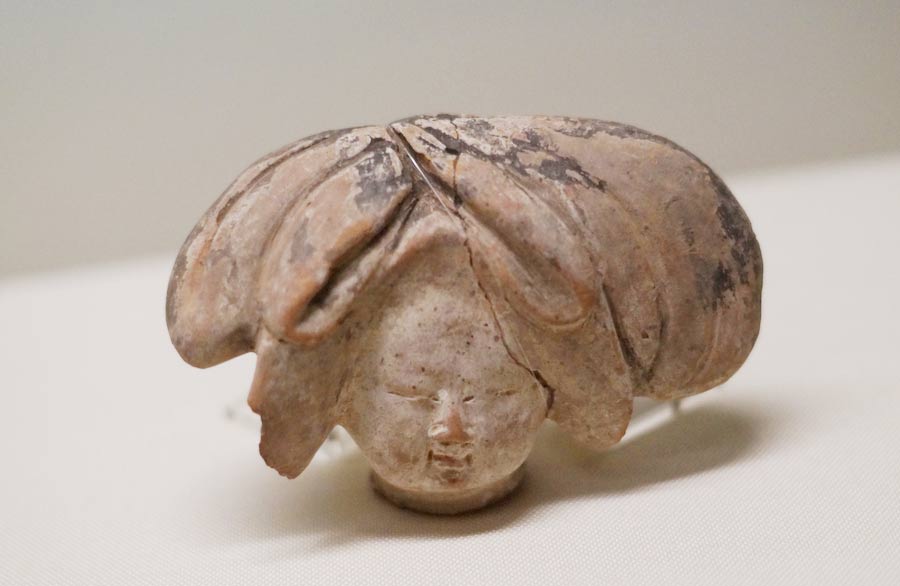 Pottery figurines showcase women's lives in ancient times