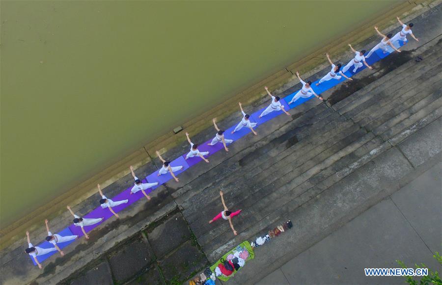 Int'l Yoga Day celebrated across China