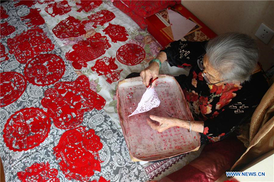 In pics: papercuttings made by 103-year-old woman