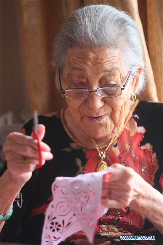 In pics: papercuttings made by 103-year-old woman