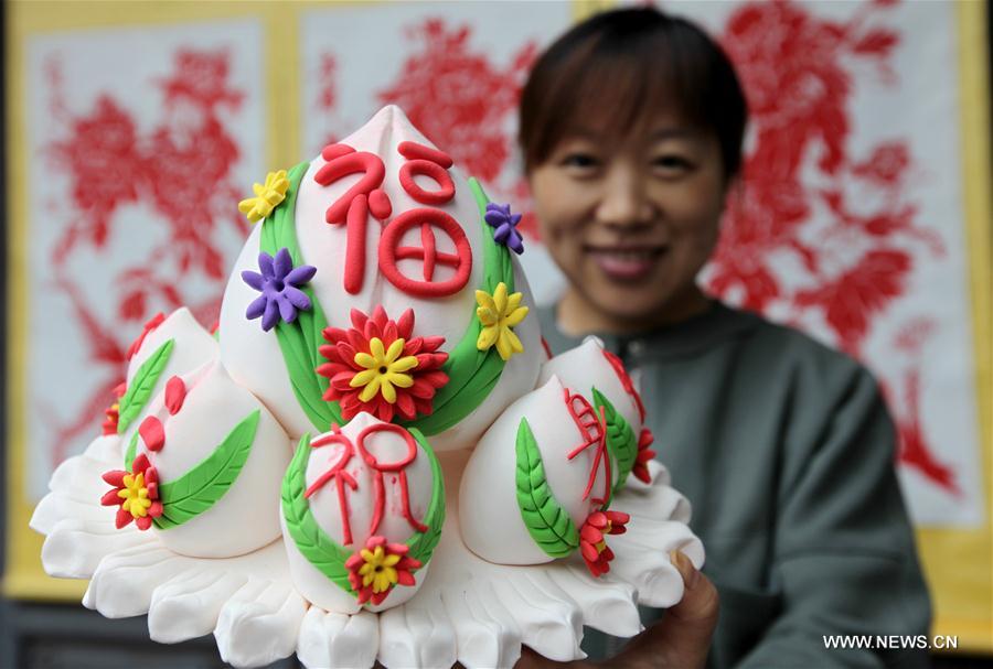 Folk artists showcase skills, stunts during competition in Shandong