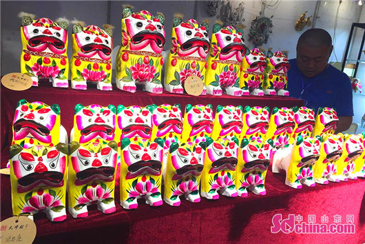 Folk arts and crafts expo held in Yantai