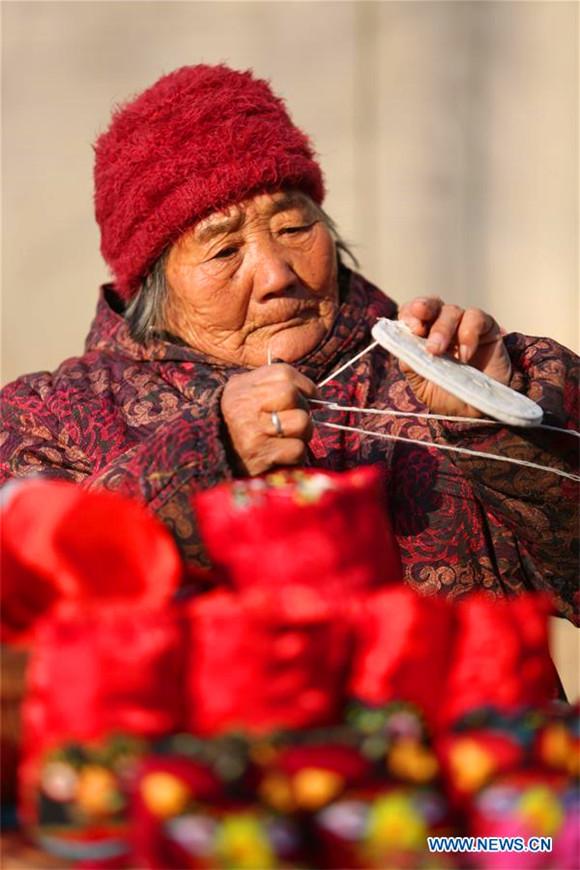 Shoemaker, 85, sews ‘tiger’ wish for children