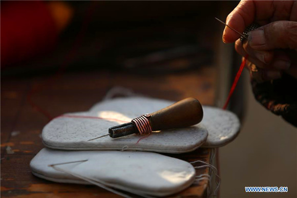 Shoemaker, 85, sews ‘tiger’ wish for children