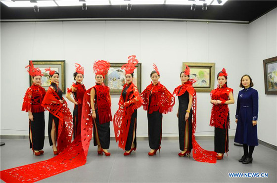 Paper cutting ornaments for qipao designed to greet Chinese Lunar New Year