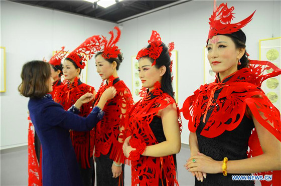 Paper cutting ornaments for qipao designed to greet Chinese Lunar New Year