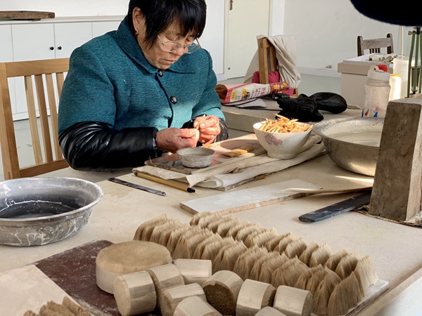 At a glance: process of making traditional writing brushes