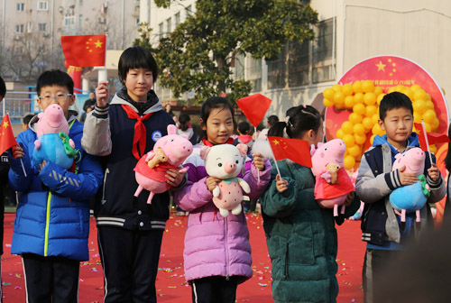 Qingdao school marks first day back