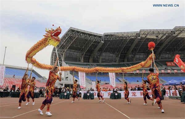 Dragon and lion dance competition held in Linyi