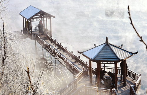 Douqi River glimpsed through morning mist