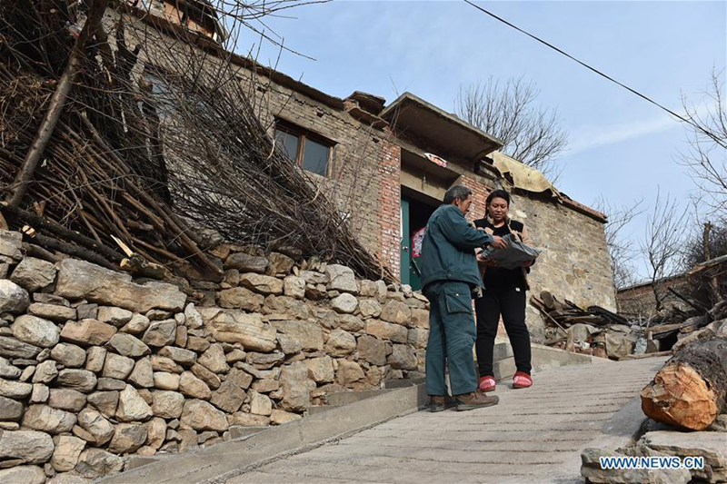 60-year-old postman working in mountainous area for 30 years