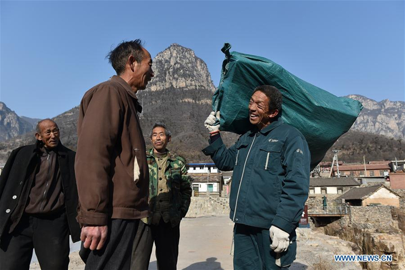 60-year-old postman working in mountainous area for 30 years