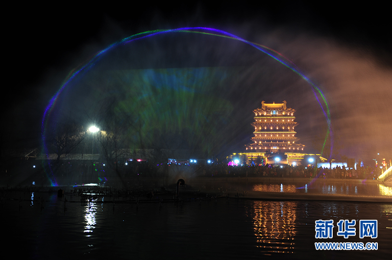 Movie projected onto water curtain near Yellow River