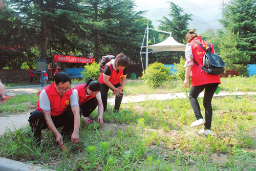 Volunteers work to improve Yongji county